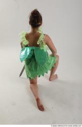 KATERINA KNNELING POSE WITH SWORD